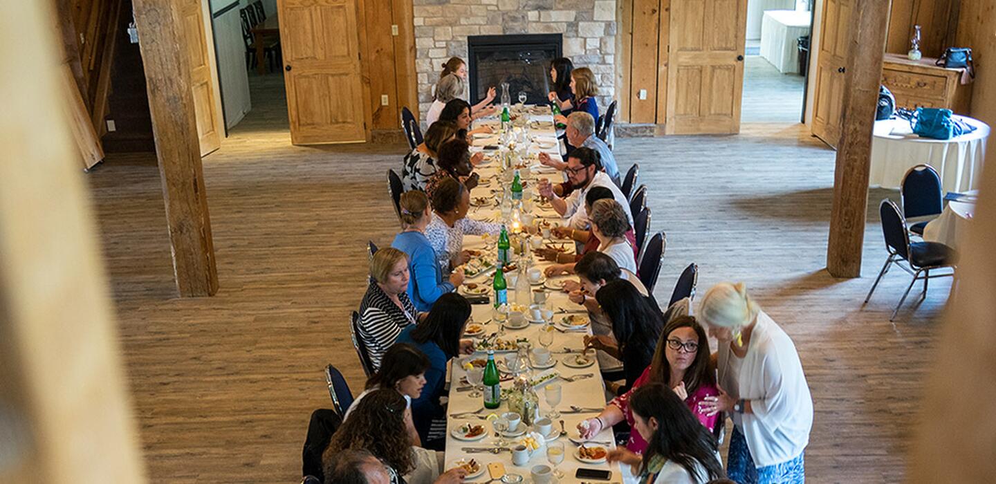 The participants sitting down for a dinner