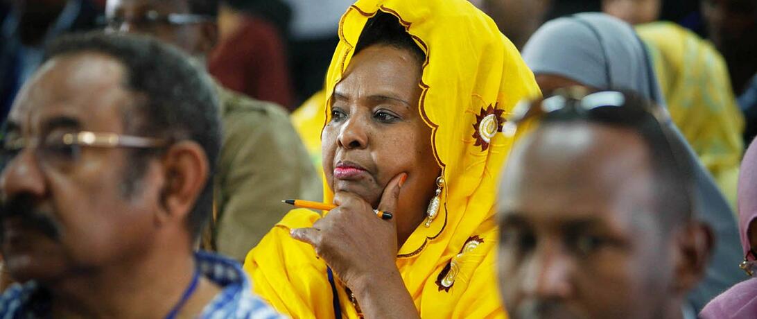  Photo caption: UN Photo/Eskinder Debebe Delegates listen during opening remarks on the first day of a civil society conference organized by the United Nations Political Office for Somalia (UNPOS), in the Somali capital Mogadishu.