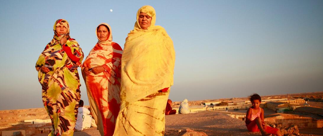 Women walk at the refugee camp near Tindouf, Algeria. 