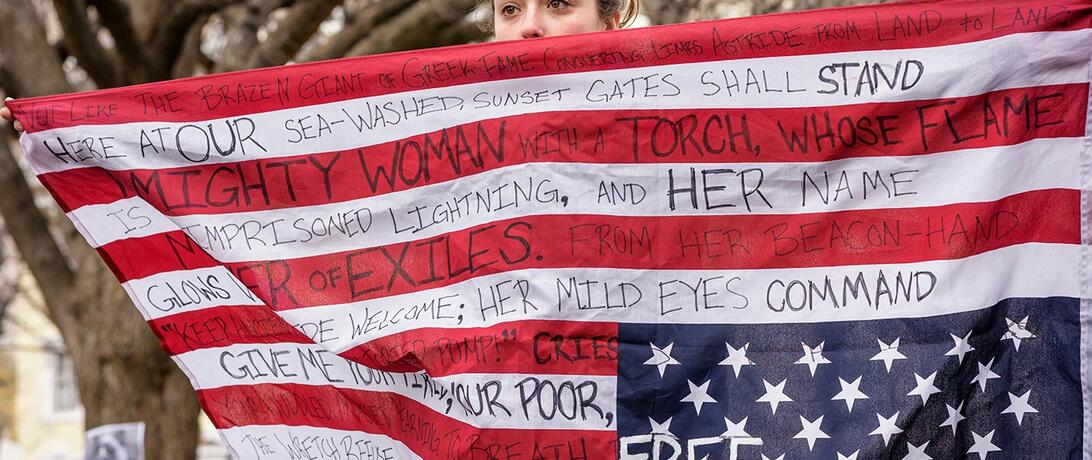 Woman holding american flag