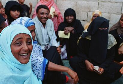 Girls in hijabs laughing